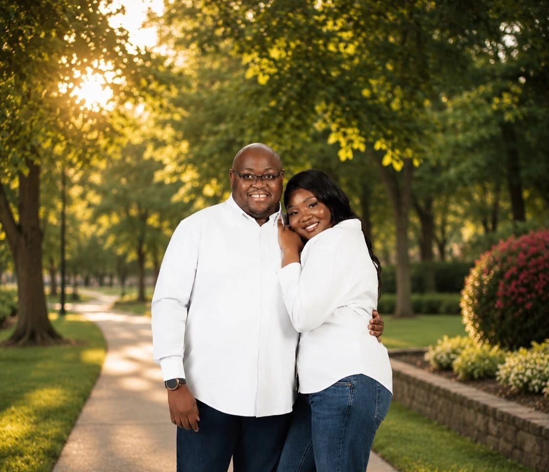 Jean-Philippe and Ketsia in a park at golden hour