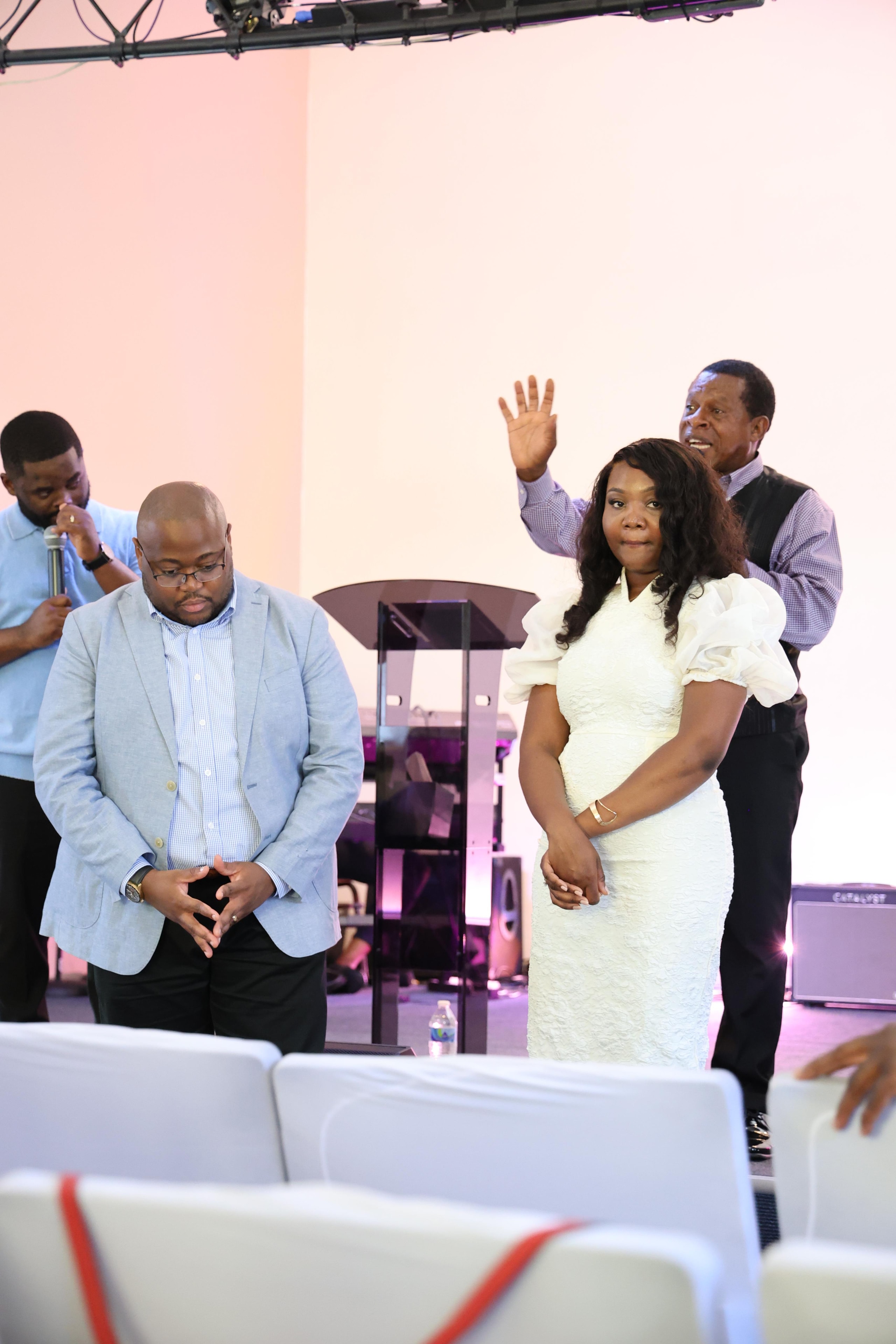 Jean-Philippe Matondo and Ketsia Biolo Matondo with the officiant at their civil ceremony