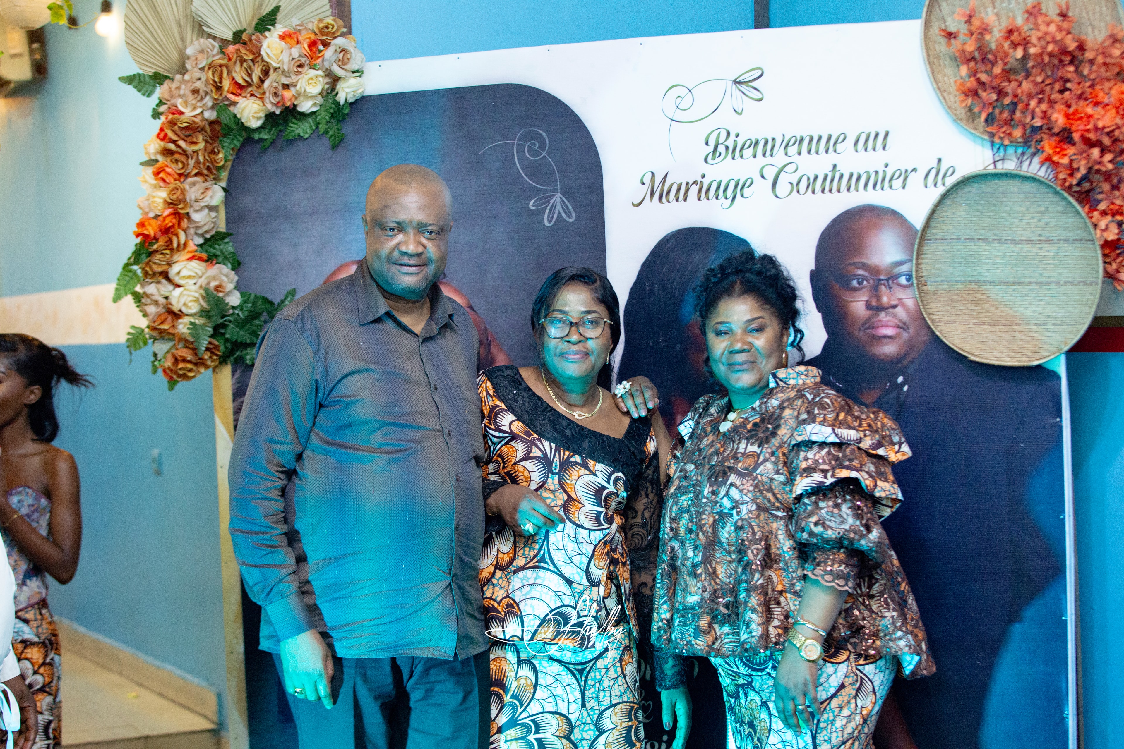 Wedding guests celebrating with Jean-Philippe and Ketsia Matondo at the ceremony backdrop